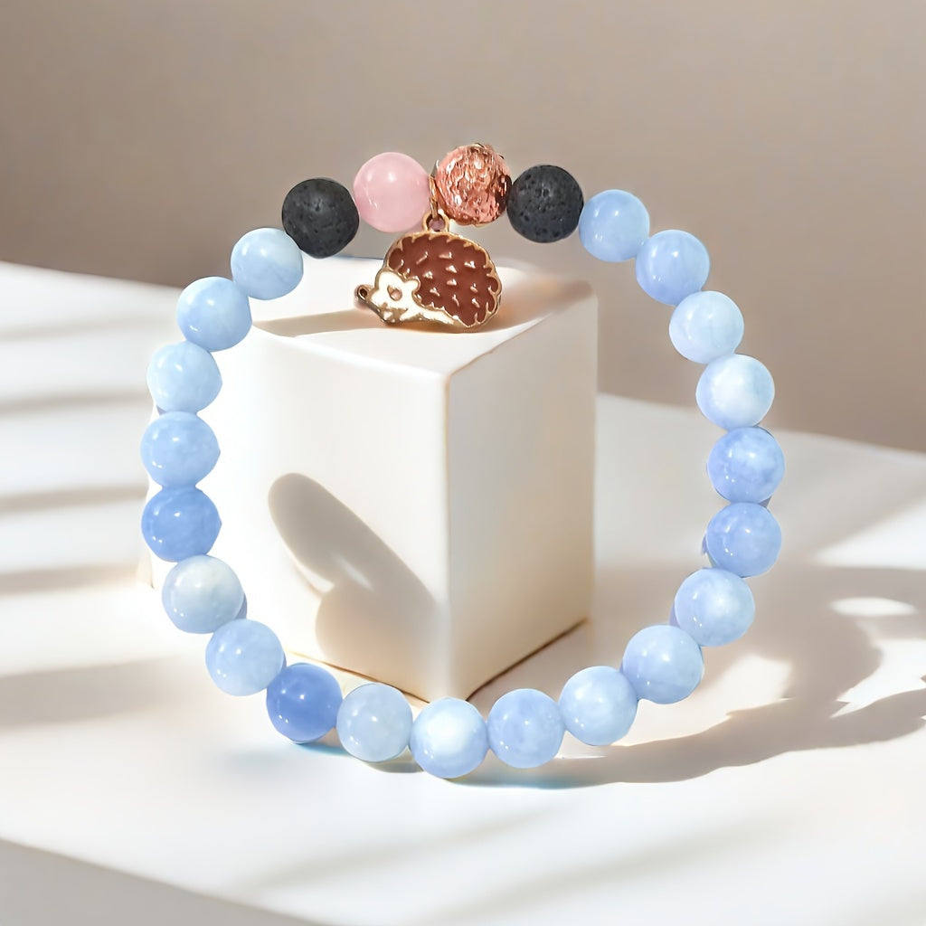 Charming Animal-Inspired Stone Bracelet: Adorn Your Wrist with a Whimsical Hedgehog Charm and Soft Blue Tones